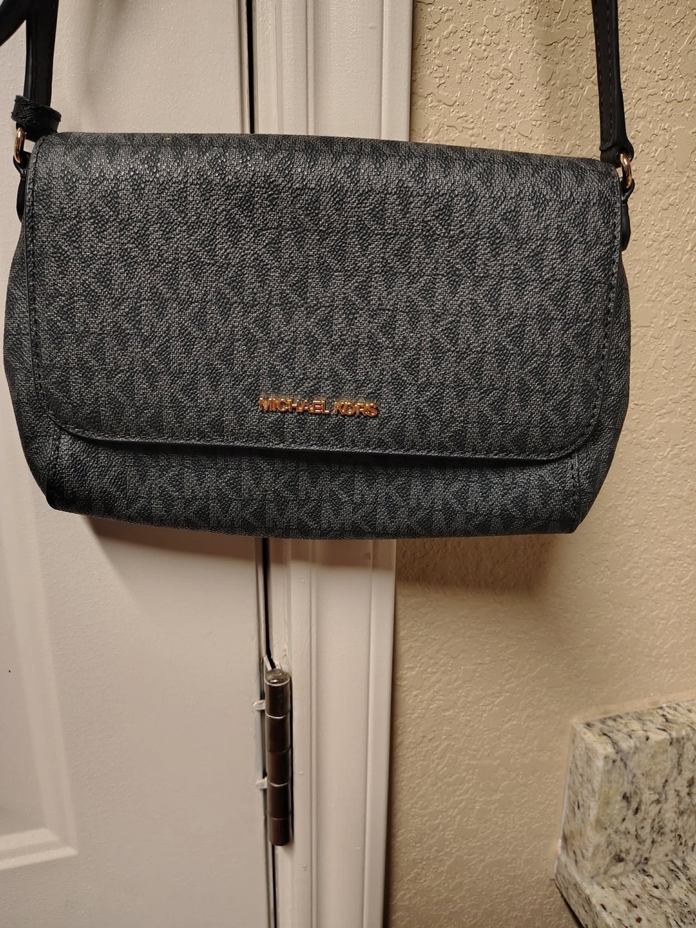 Michael Kors Black and Gold Logo Crossbody Bag